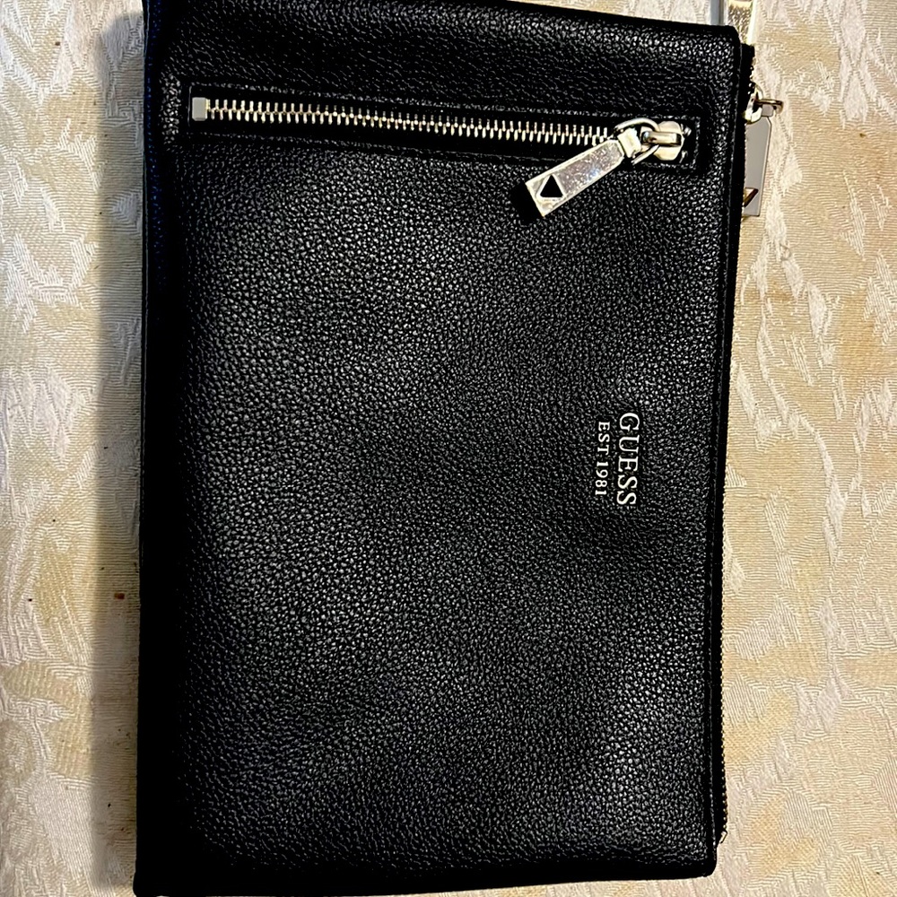 Black clutch with gold accents approx 12” by 6” in good working condition